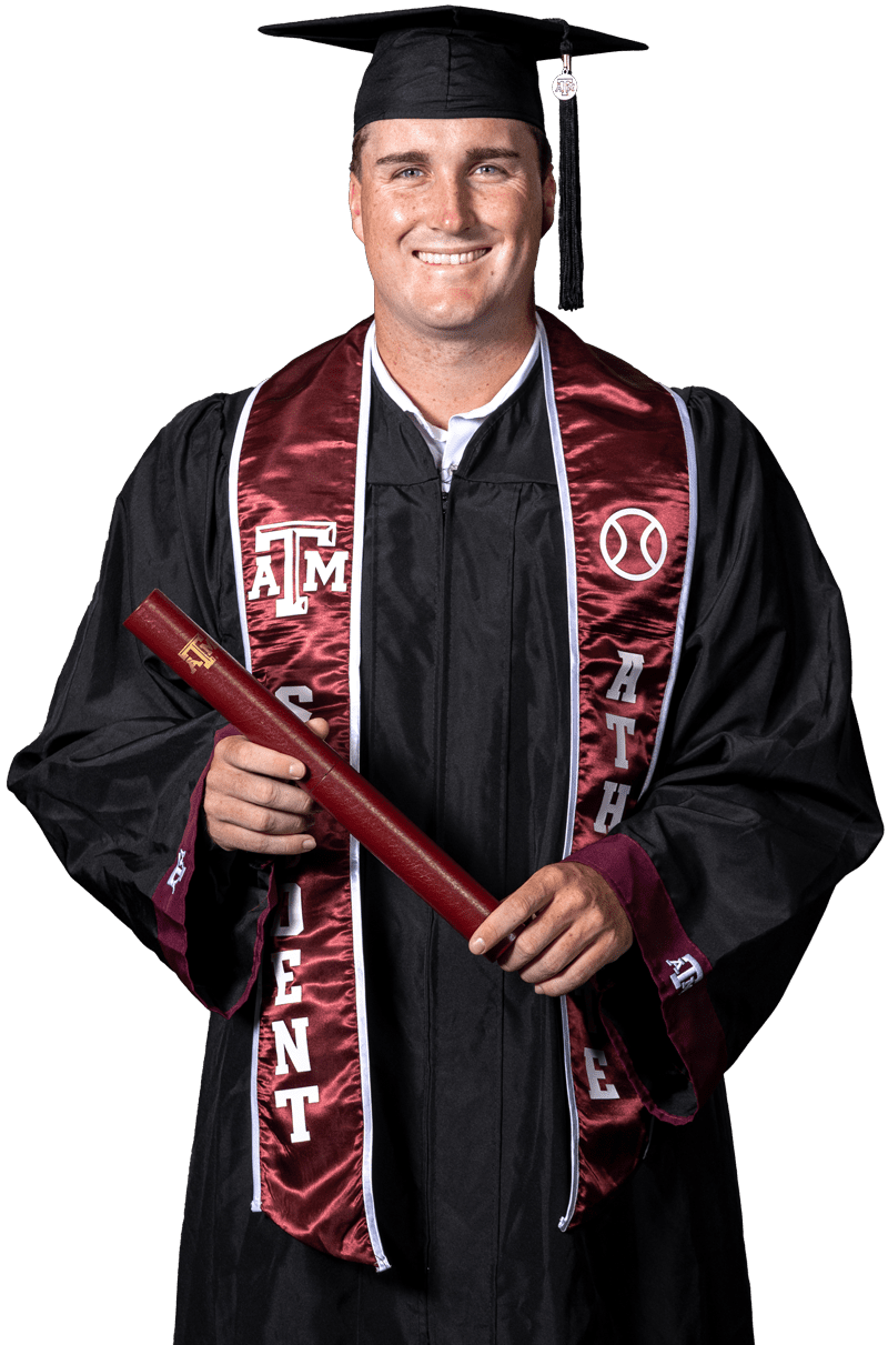 Graduate in cap and gown with diploma