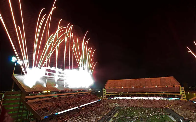 Fireworks going off in side the football stadium