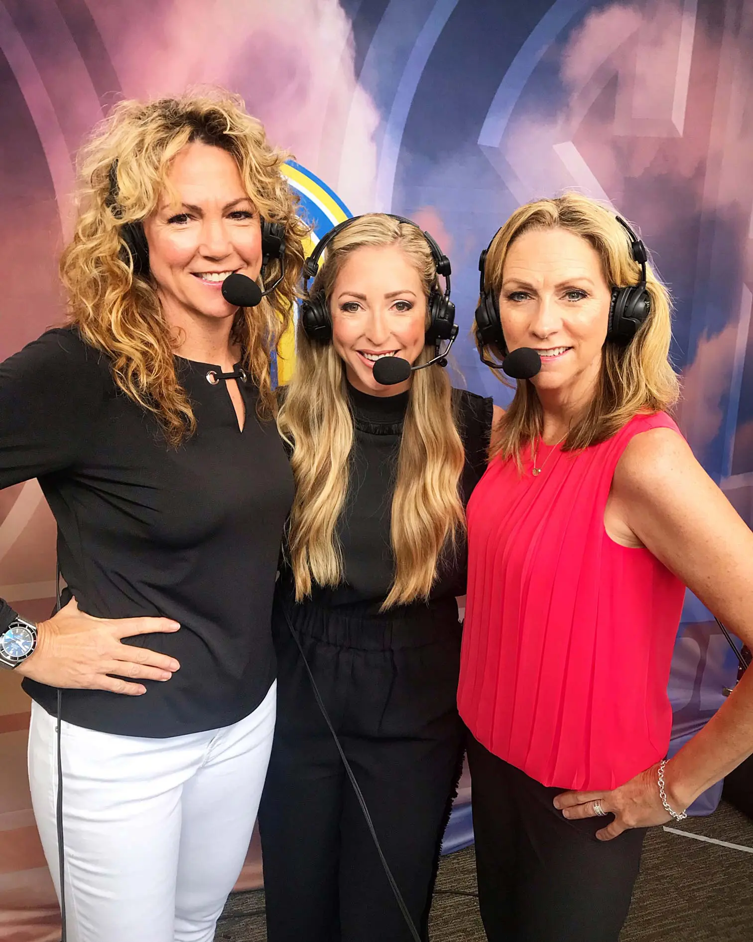 Amanda Scarborough and two other women with headphones and microphones