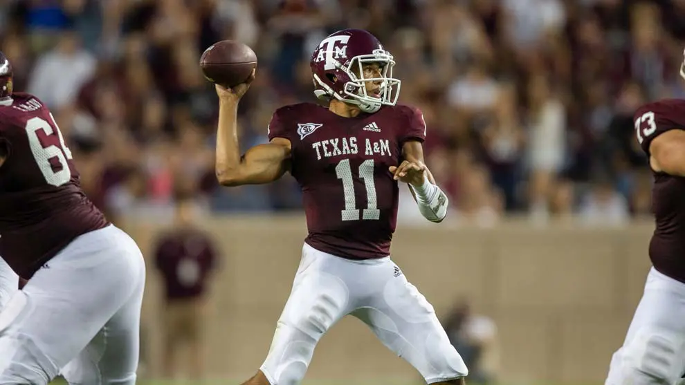 Football player throwing the ball