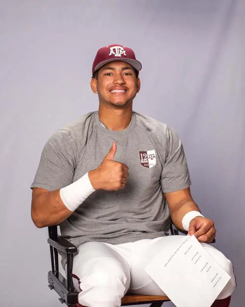 Student-athlete giving thumbs up