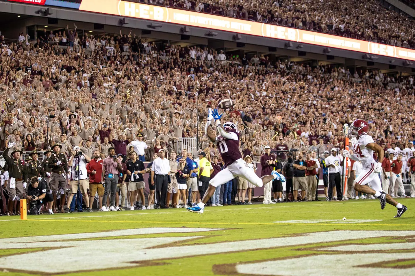 Ainias Smith playing in a football game