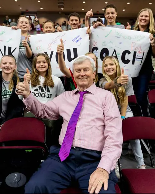 Gary Blair posing with children at event