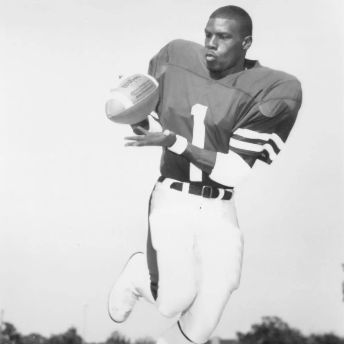 Mickey Washing catching a football