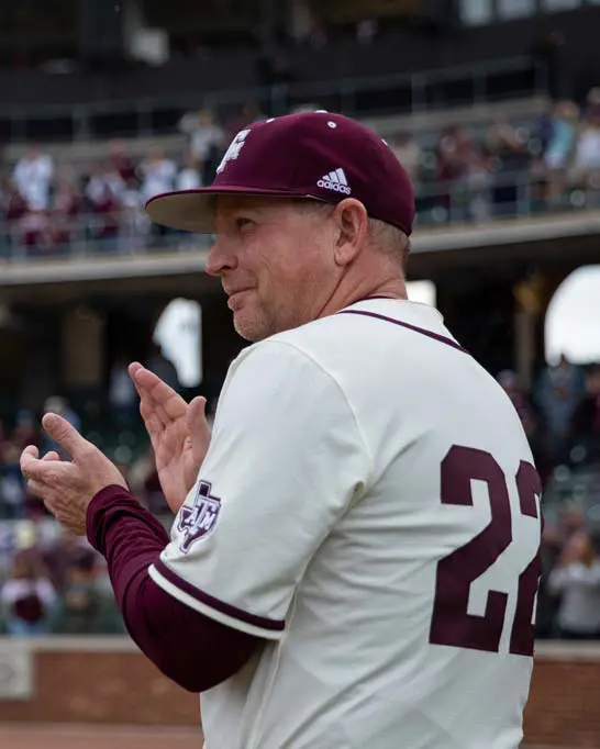 Jim Scholssnagle clapping on the baseball field