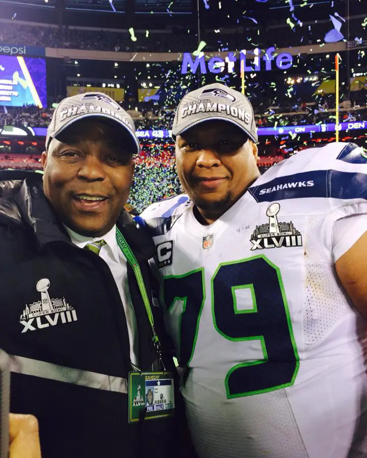 Joseph Bryant on field after winning the super bowl