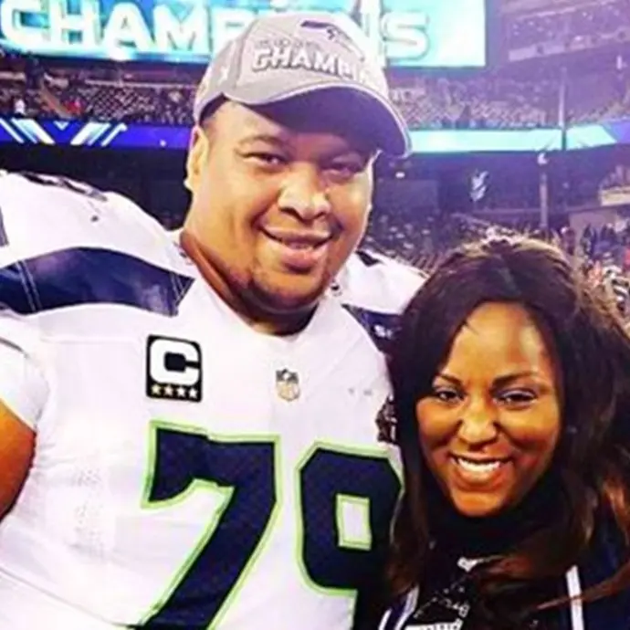 Joseph Bryant on field after winning super bowl