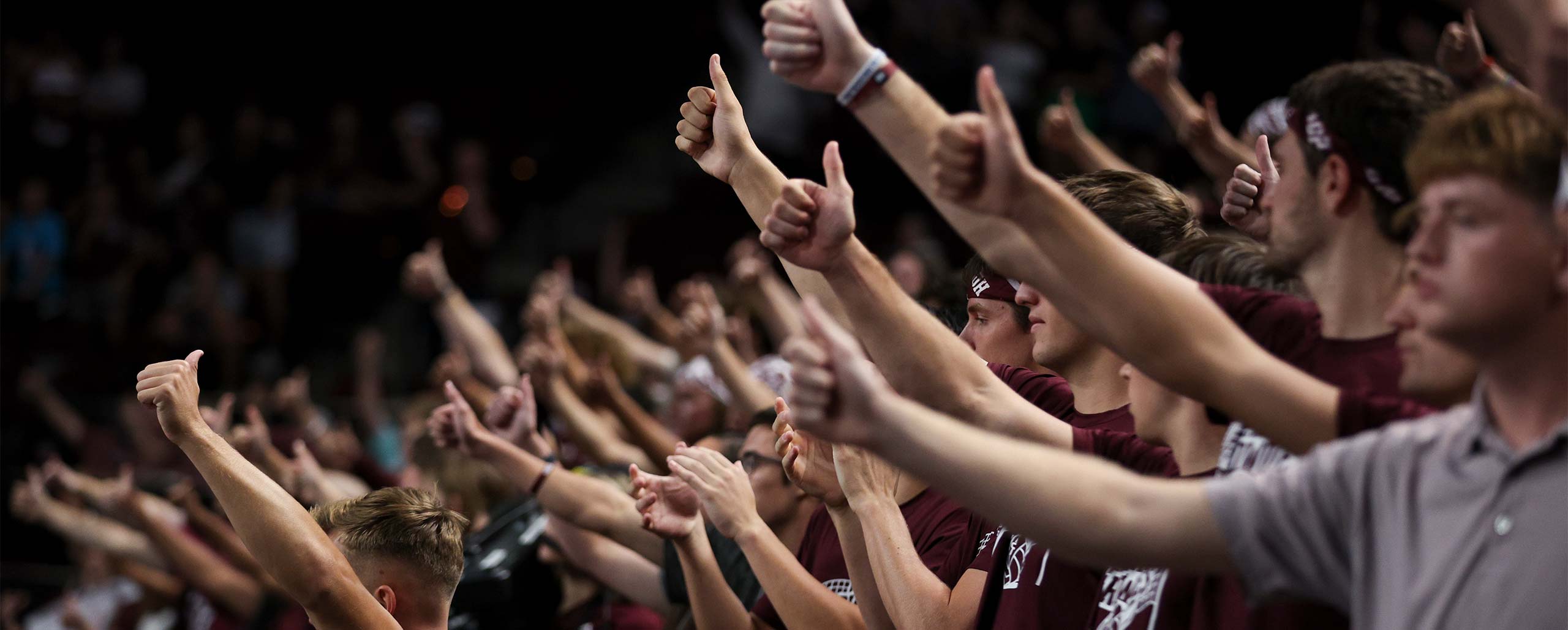 Fans giving thumbs up