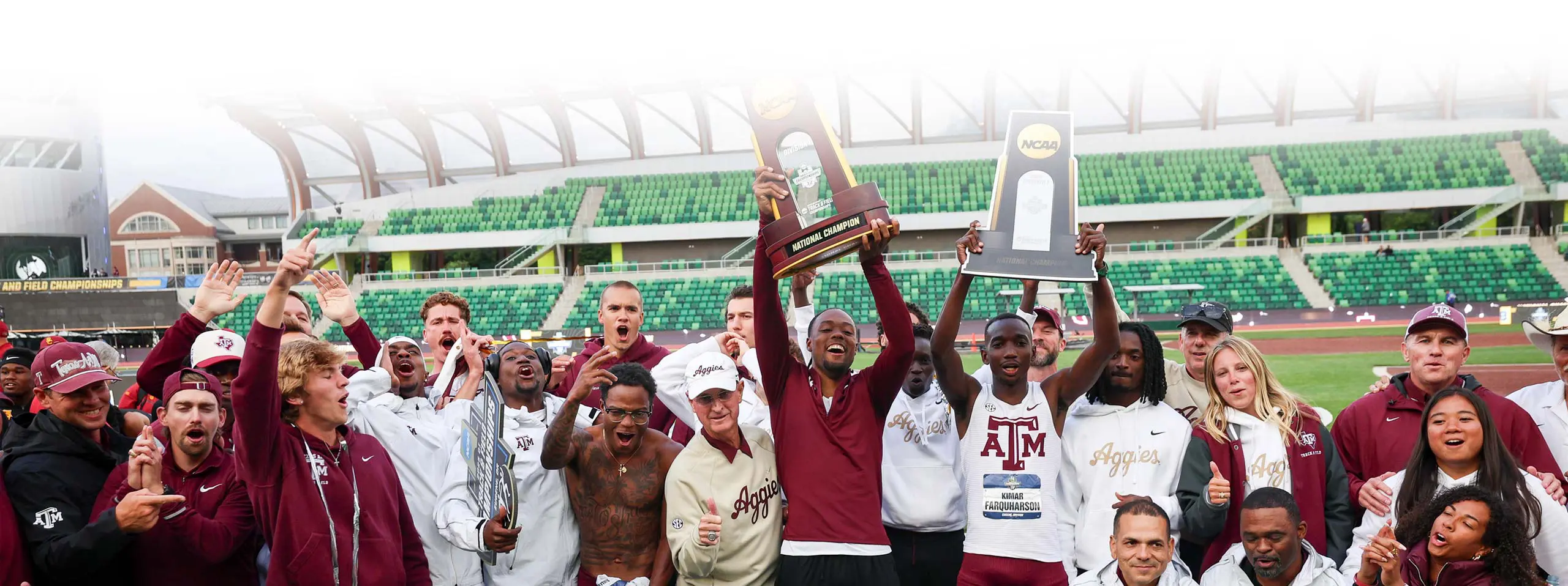 team holding trophies