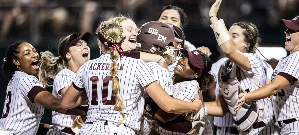 Softball team celebrating